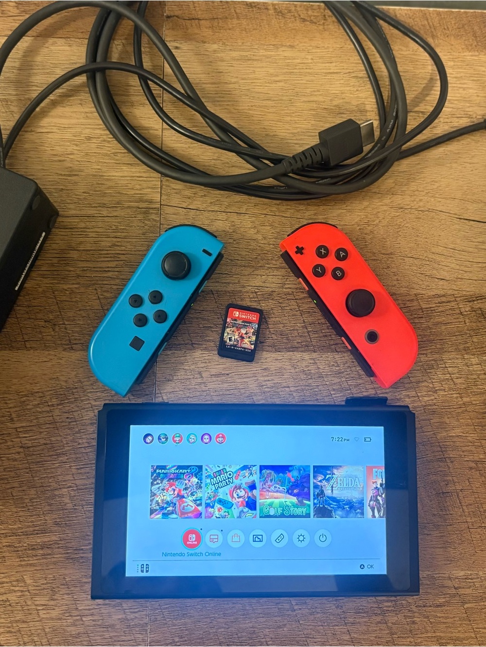 Nintendo Switch with Hard Shell Case, Mario Kart, Joy Cons, TV adapter